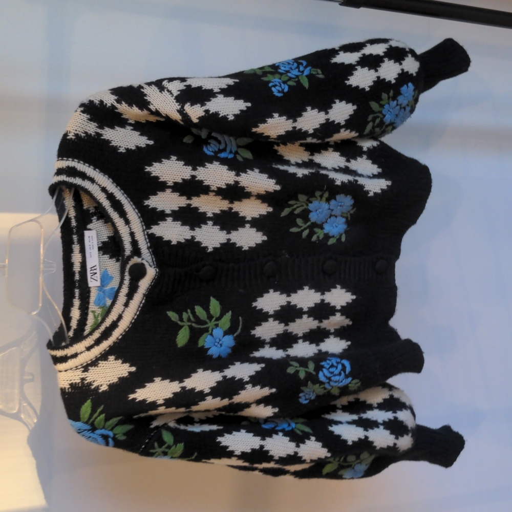 Zara button front black and white sweater with blue floral embroidery